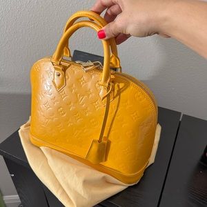 Louis Vuitton Vernis Alma PM bag
